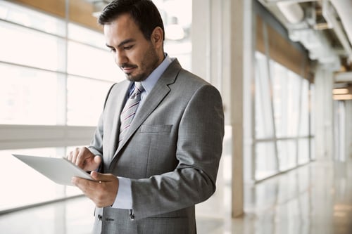 business-man-on-tablet