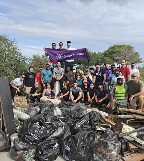 Grant Thornton Malta employees unite for coastal clean-up to mark firm-wide CSR Day