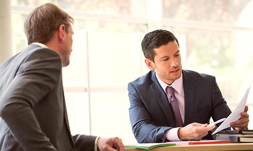 Two businessman at a meeting