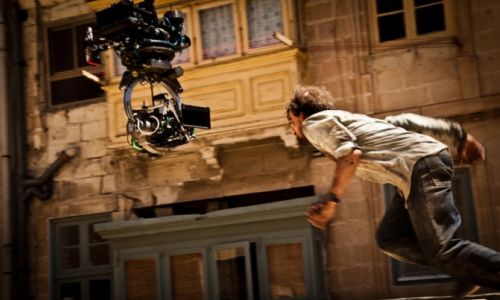 A camera is filming a actor in action for World War Z